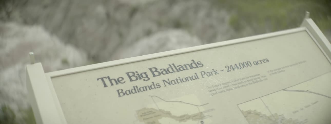 A sign describing a national park