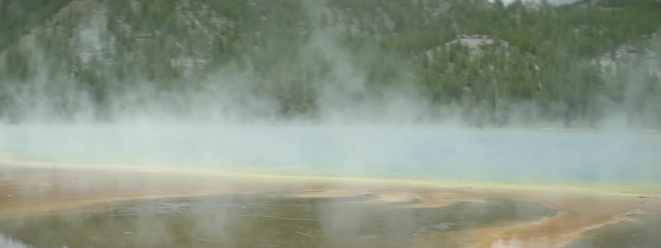Mist rises from a lake