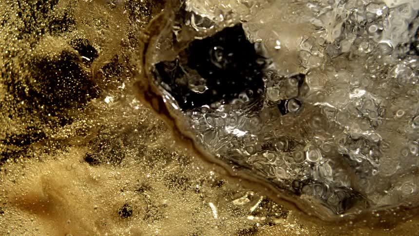 Brown water splashes around