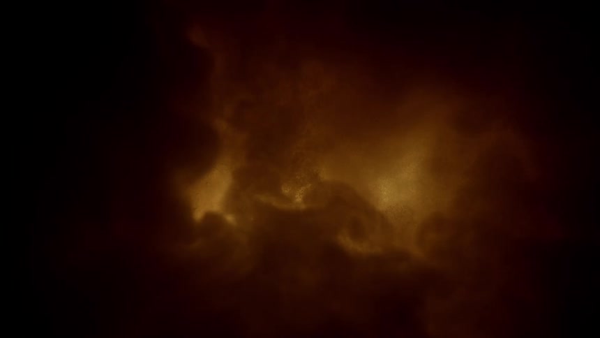 Golden liquid swirling under diffused light
