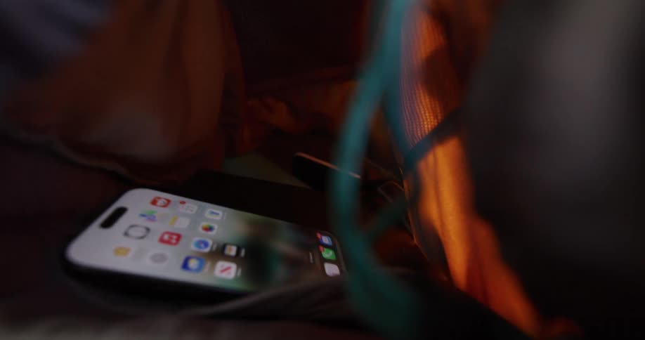 Smarphone indise a partially open backpack