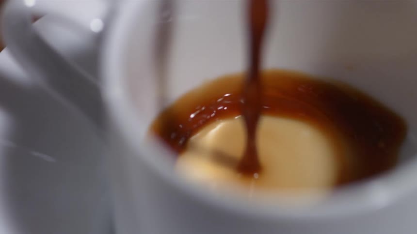 A mug is filled with coffee