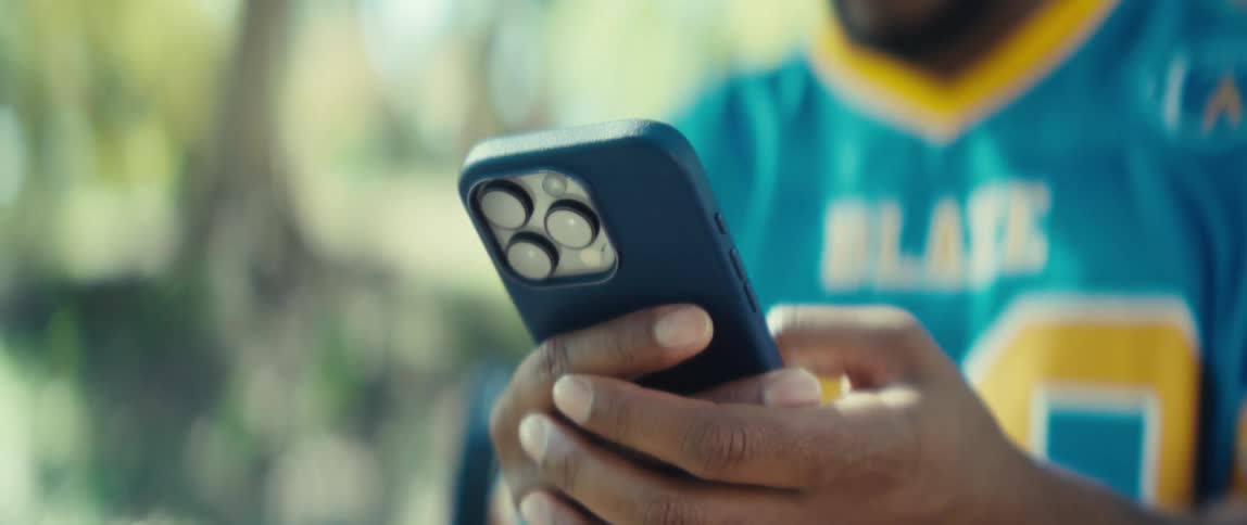 A man texts on his phone