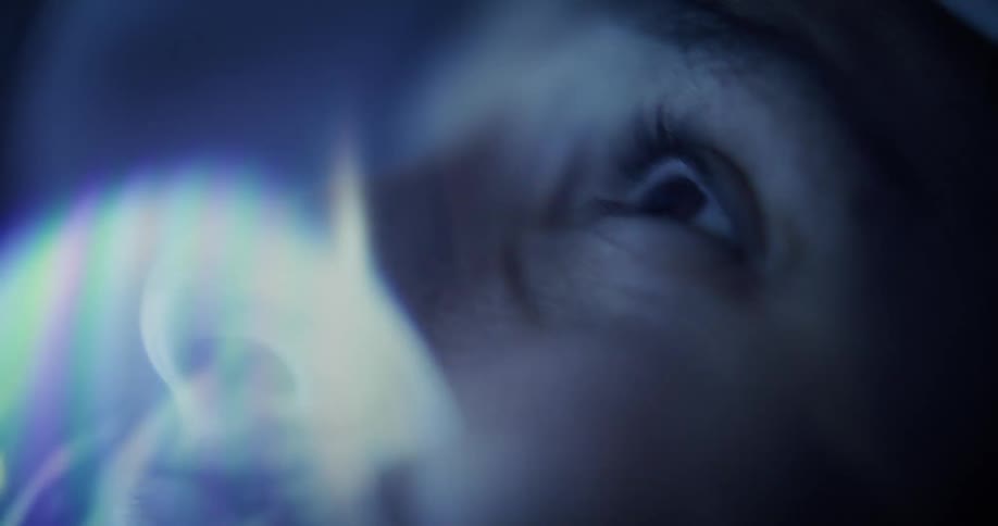 Astronaut with lights on their face