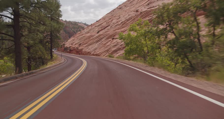 Riding down a canyon road