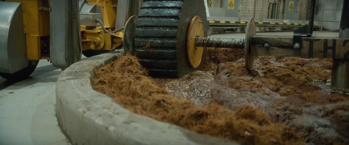 The machine is grinding the mud