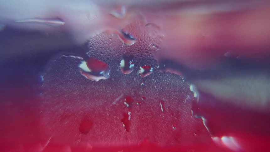 Red liquid ebbs and flows