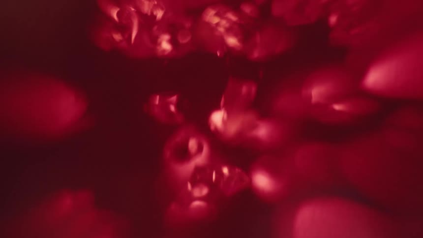 Red gemstones raining down