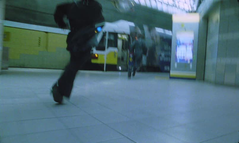 The woman chases after a man in the subway