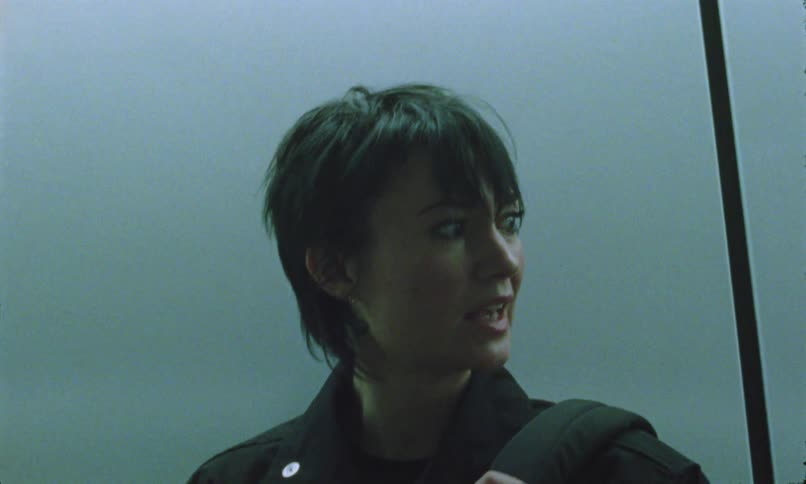 A woman that looks nervous in a room