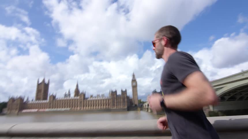 A man running outdoors in a city