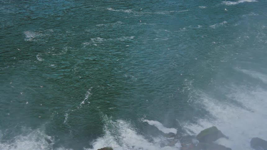 An aerial view of waves in the ocean