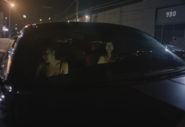 Two women getting out of the car