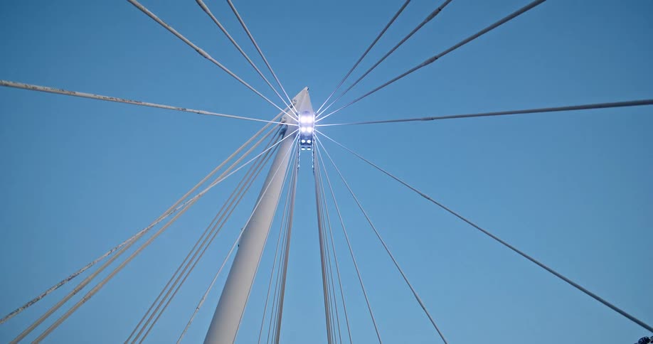 View looking up at cables on a suspension bridge