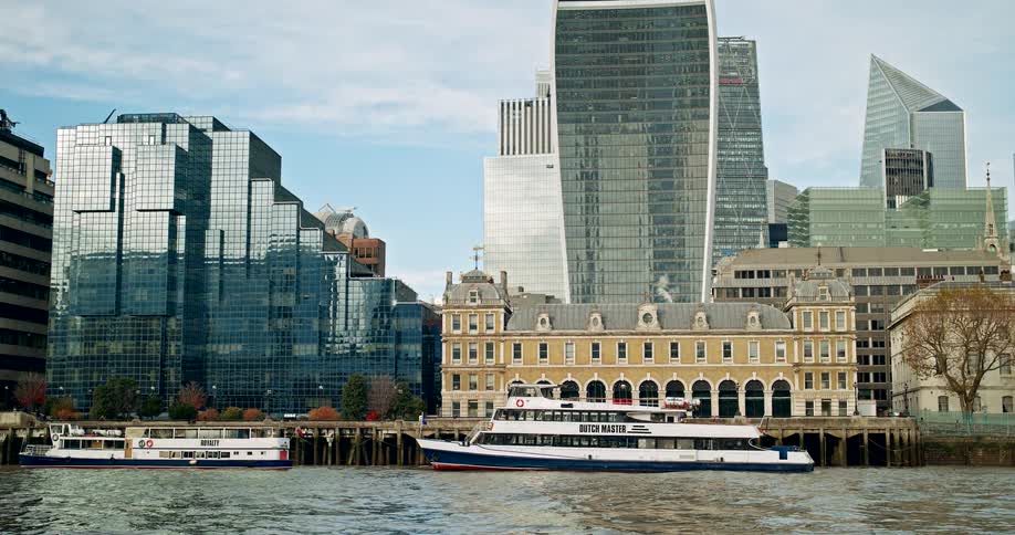 view from the water of the thames riverfront in london