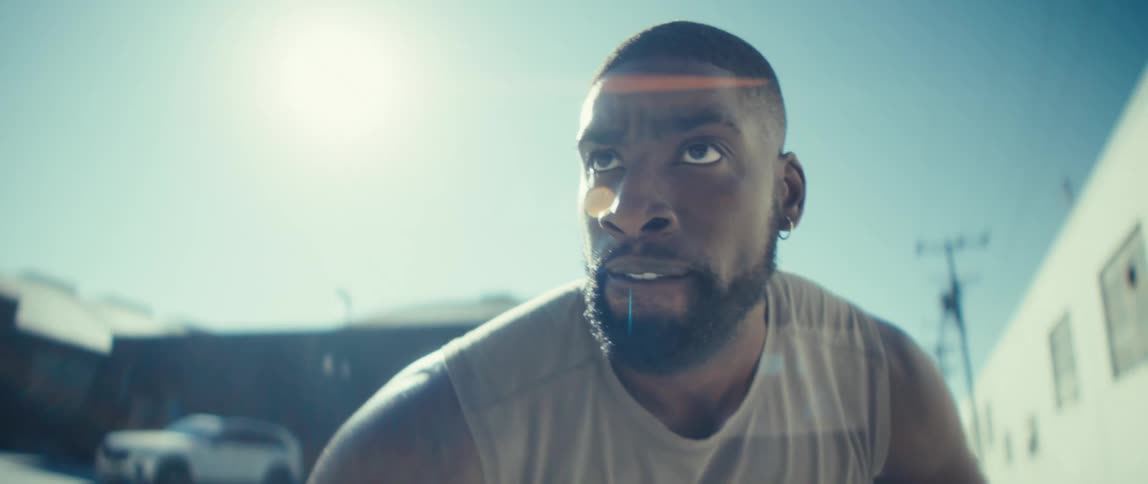 Man running with a focused and determined expression