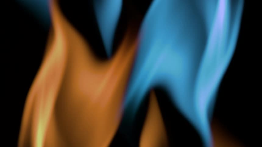 Two tall vibrant plumes of orange and blue flames gracefully dance and sway on a completely black background the contrasting pure colors flow upward with smooth mesmerizing motion creating a dynamic visual effect