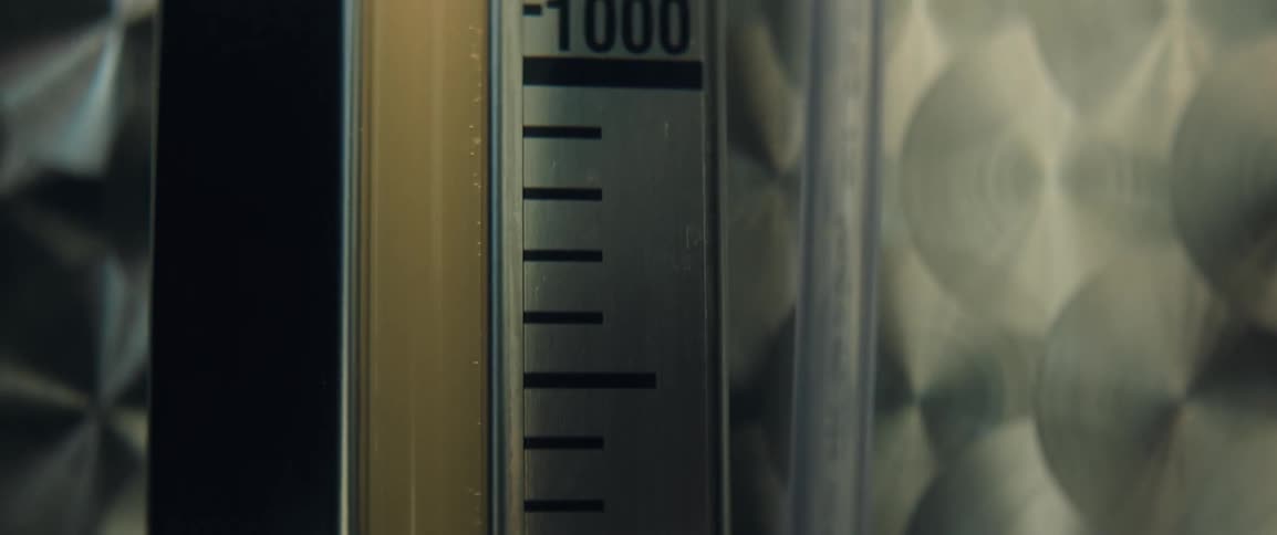 Measurement gauge shows liquid level in a metal tank