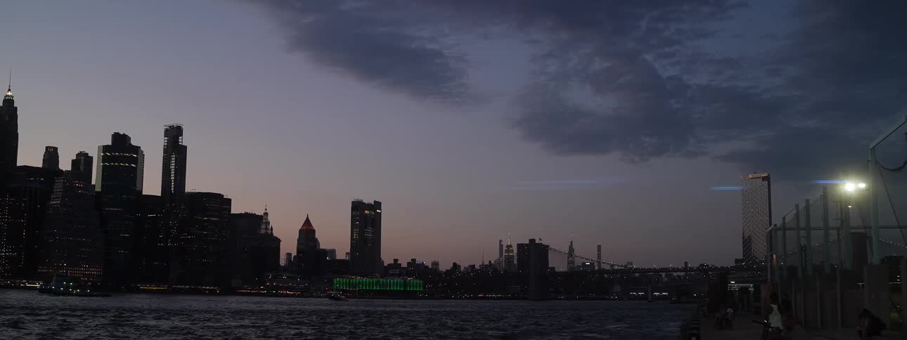 A metropolitan cityscape at sunset