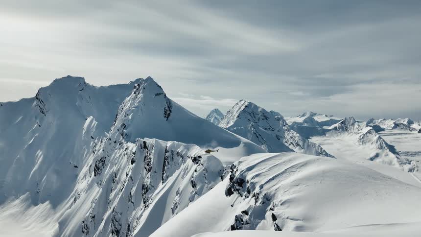 The mountains are covered in heavy snow
