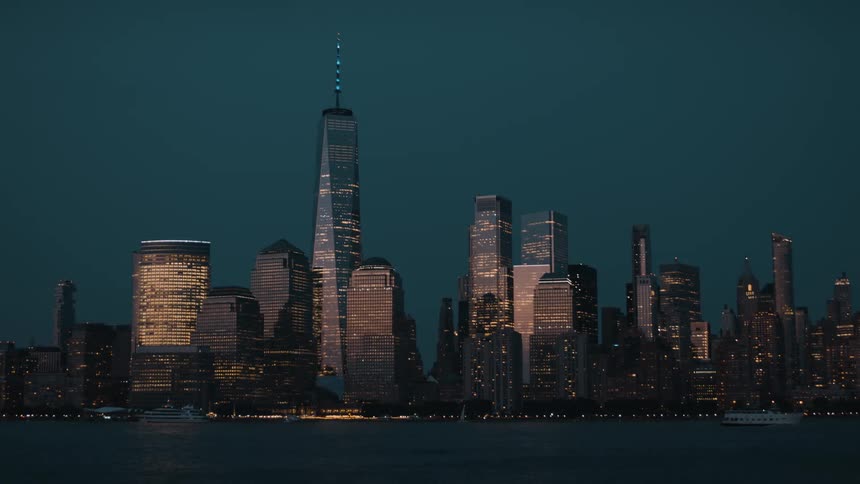 A lit metropolitan city skyline at night