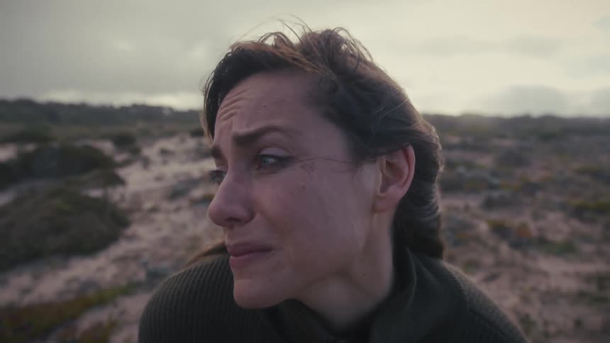 A woman crying outside