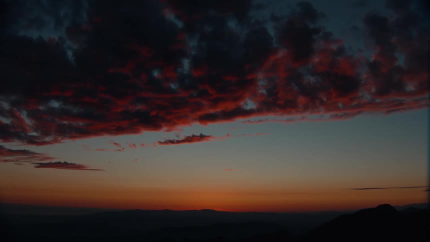 Sunset paints the clouds