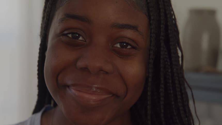 Closeup of a young woman smiling
