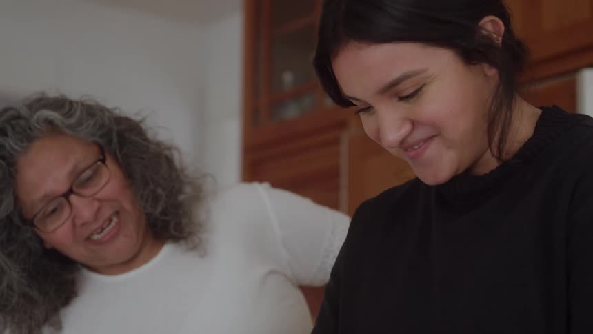 The mother and daughter are talking