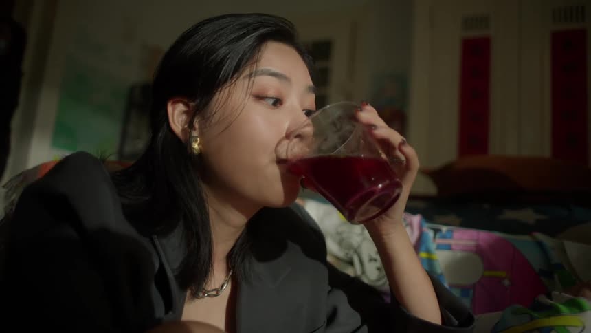 Women eat and drink wile sitting together