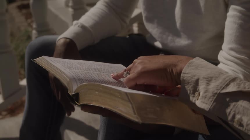 Two people reading books together