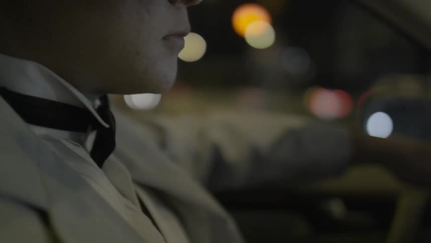 Close up of man driving a car