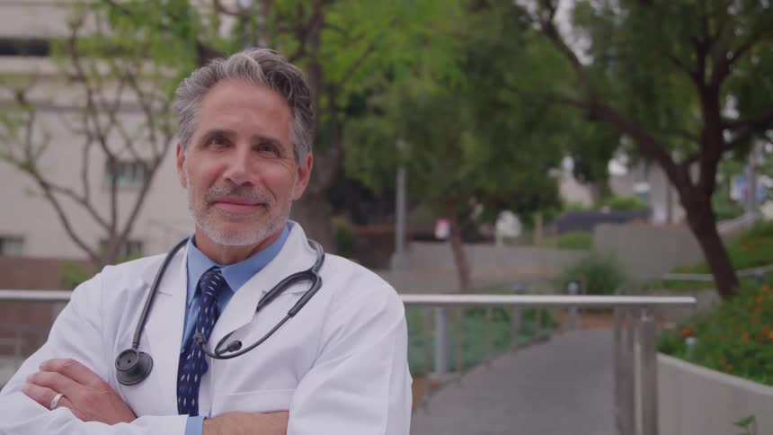 A doctor standing outside