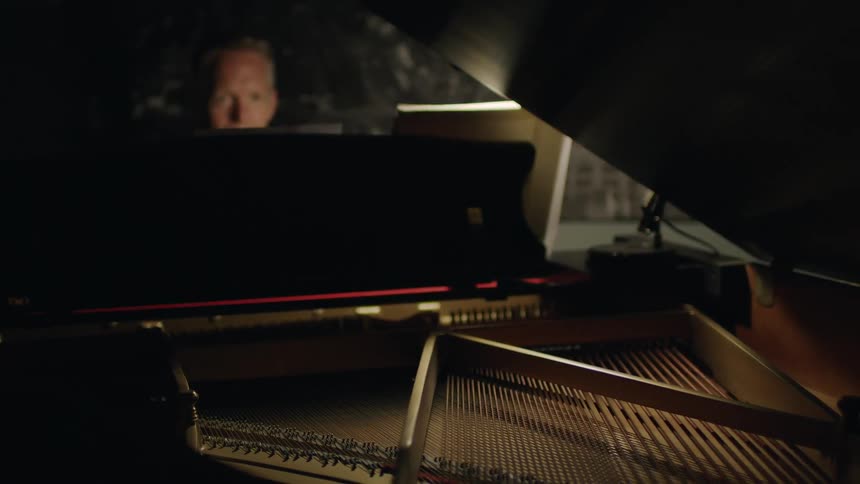 Man sitting at a piano