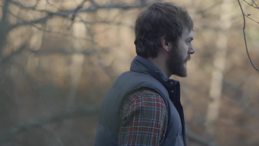 Man stands in the forest