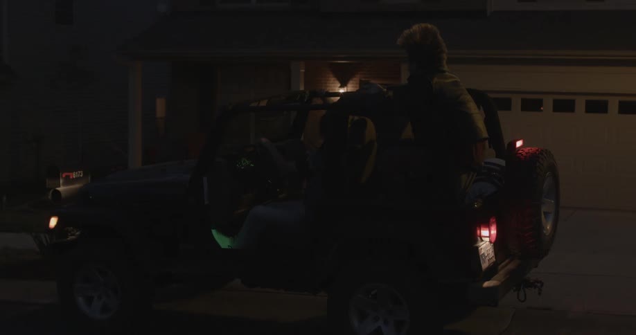 A jeep picks a person up from their home
