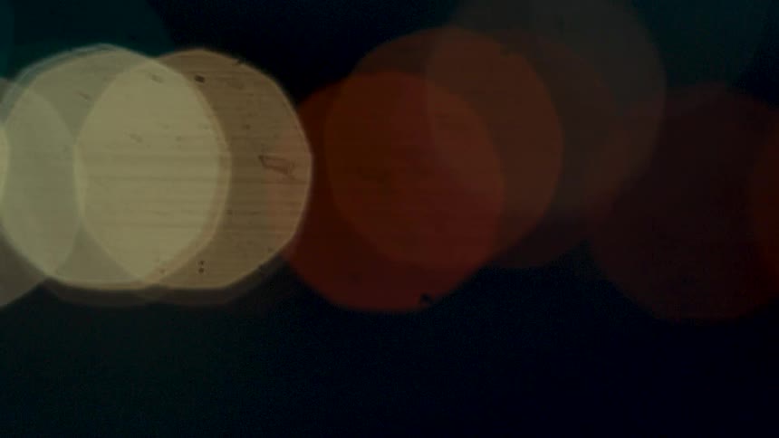Vehicles headlights move with the traffic
