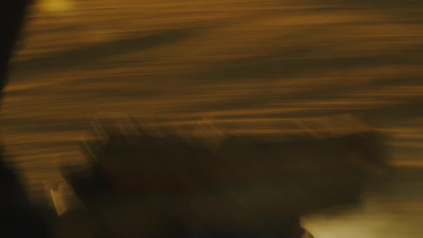 A person riding a dirt bike outdoors