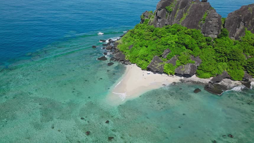 Grey mountains cover the small island