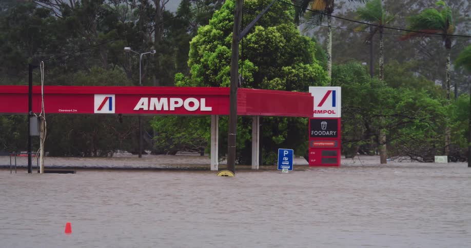 The parking lot is flooded during a storm