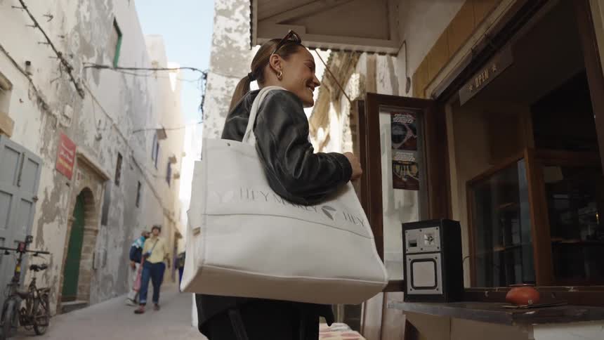 The tourists talks to people in a shop