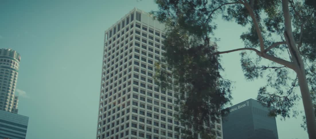 The tall buildings are lined up together