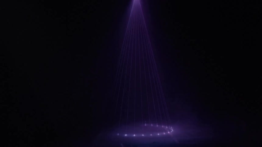 Cone of purple light beams over circular ground lights in dark atmospheric setting