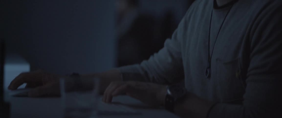 A man types on a keyboard