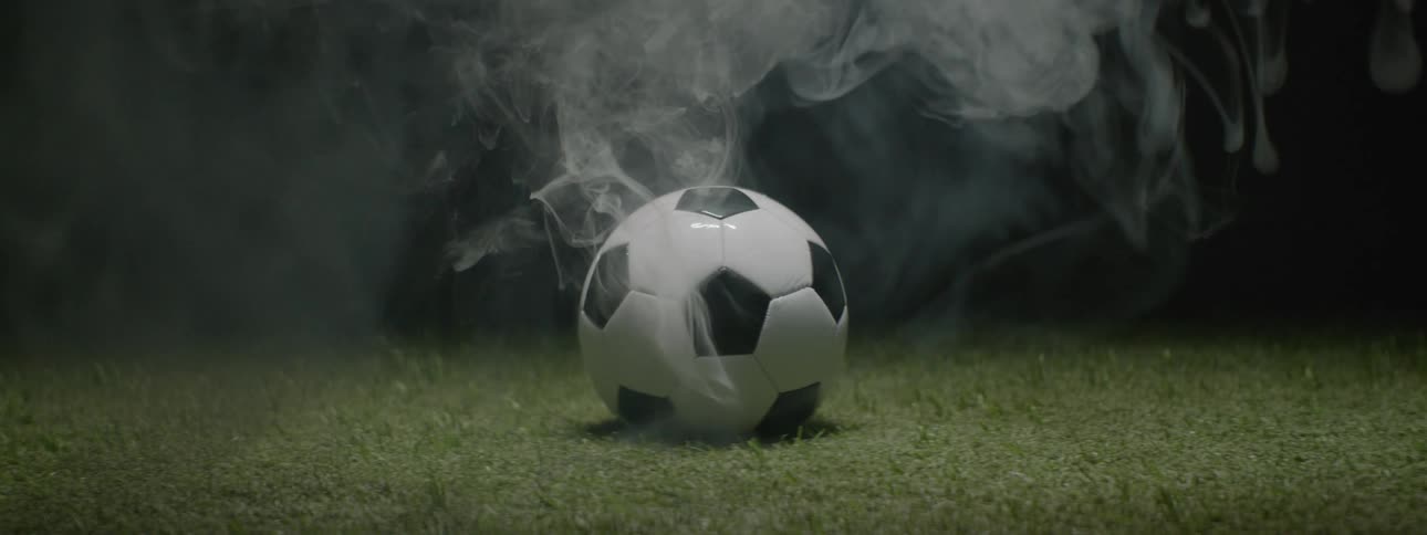 Soccer ball with smoke coming out of it indoors