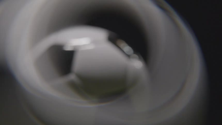 Soccer ball appears distorted by a lens effect in closeup