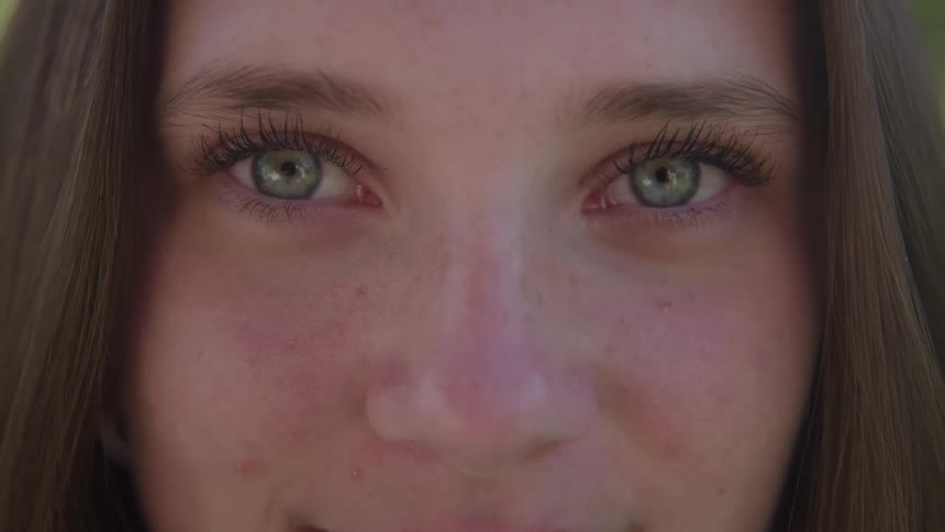 Young female person smiling outdoors during day time