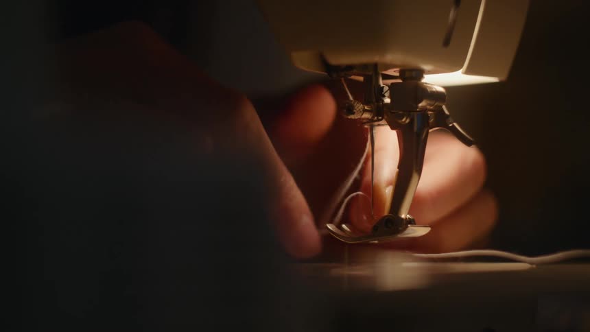 Threading a needle on a sewing machine