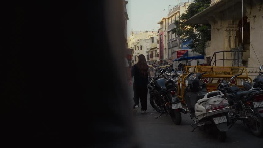 People walking down the street in a city