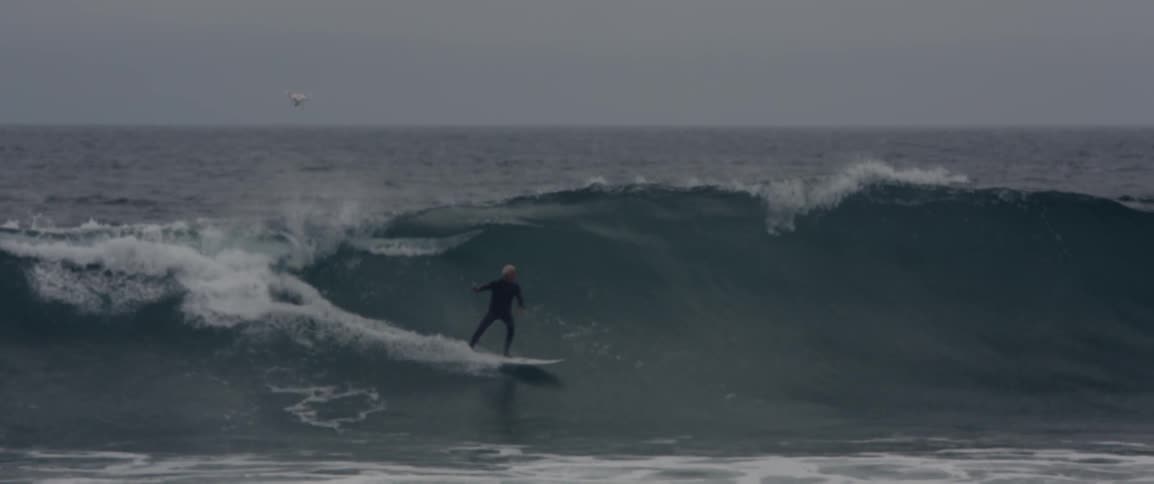 Man surfing waves in the ocean